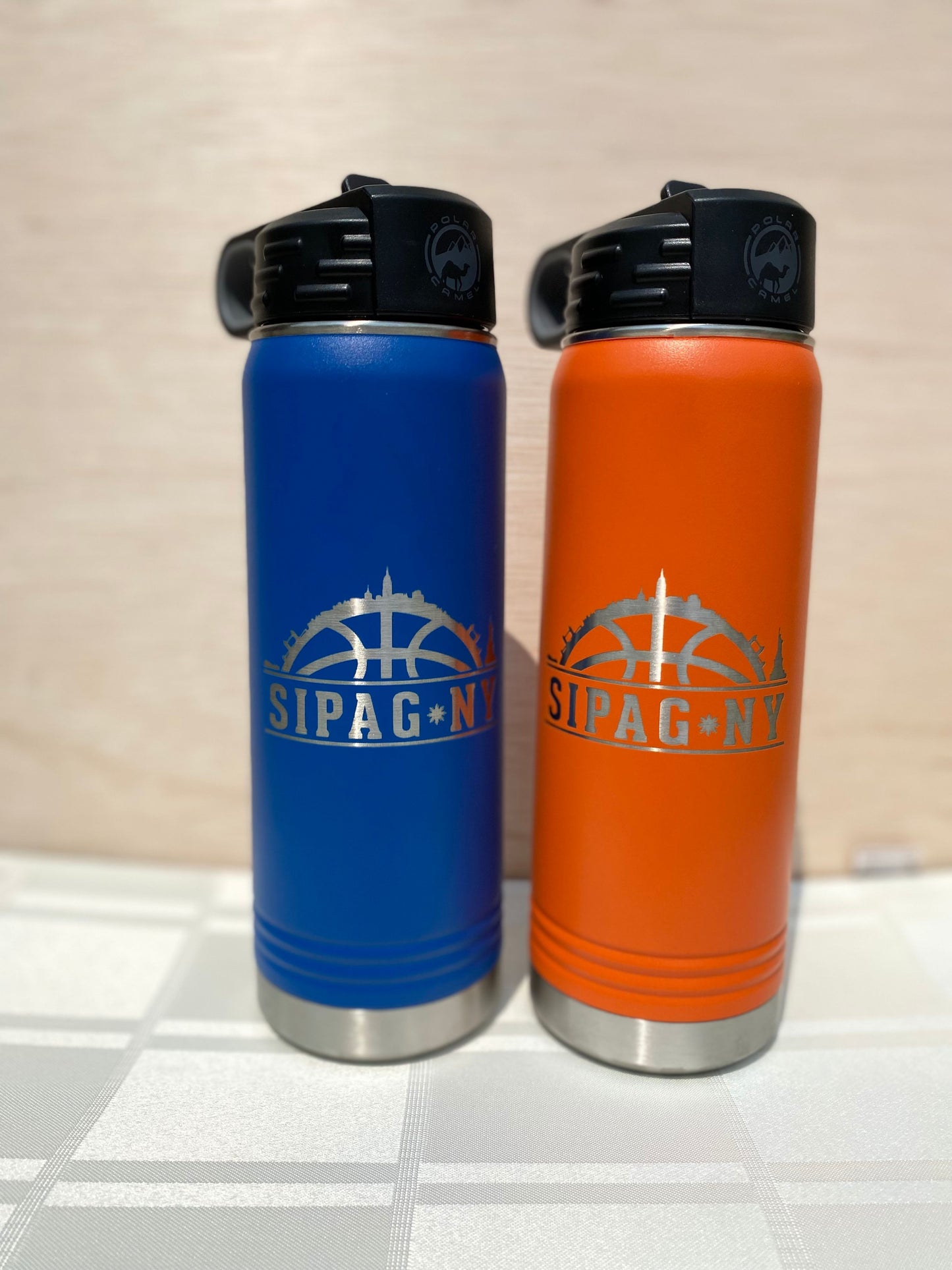 20oz SIPAG-NY water bottle; name engraving on the back