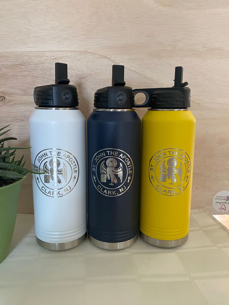 32 oz Straw Water Bottle with St. John the Apostle logo